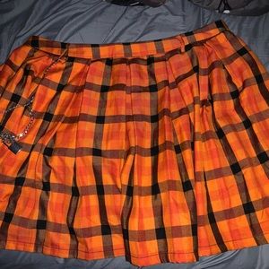 Orange plaid hot topic skirt, with attached chain
